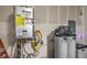 Water softener and heater system setup featuring modern units and professional plumbing at 10140 Magnolia Creek St, Las Vegas, NV 89141