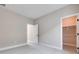 Neutral bedroom with a doorway to the walk-in closet at 10448 Smokey Mariposa, Las Vegas, NV 89166