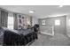 This bedroom features modern decor, and a comfortable workspace with natural light at 106 Basketflower Ct, Las Vegas, NV 89183