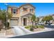 Charming two-story home with a well-maintained lawn, driveway, and attached garage at 106 Basketflower Ct, Las Vegas, NV 89183
