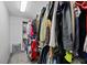 A well-organized walk-in closet offers ample storage space for clothing and accessories at 106 Basketflower Ct, Las Vegas, NV 89183