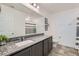 Stylish bathroom featuring granite countertops and modern fixtures at 10650 Sariah Skye Ave, Las Vegas, NV 89166