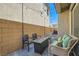 Inviting patio with seating, fire pit, and string lights at 10650 Sariah Skye Ave, Las Vegas, NV 89166