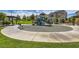 Community playground with modern play equipment and shaded seating areas for families to enjoy at 10650 Sariah Skye Ave, Las Vegas, NV 89166