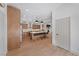 Bright kitchen with stainless steel appliances, island seating and light wood floors at 10814 Franklin Hills Ave, Las Vegas, NV 89135