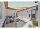 Stylish outdoor patio with plush seating, ideal for enjoying peaceful moments and outdoor gatherings at 10814 Franklin Hills Ave, Las Vegas, NV 89135