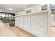 Bright kitchen island with seating and storage, adjacent to the living room at 11271 Winter Cottage Pl, Las Vegas, NV 89135