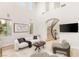 Bright living room with tall ceilings, lots of light and modern furnishings at 11271 Winter Cottage Pl, Las Vegas, NV 89135