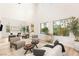 Bright living room with tall ceilings, lots of light and modern furnishings at 11271 Winter Cottage Pl, Las Vegas, NV 89135