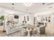 Spacious living room with an open floor plan, modern decor, and lots of natural light at 11271 Winter Cottage Pl, Las Vegas, NV 89135
