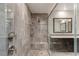 Modern bathroom featuring a glass enclosed shower with bench and dual shower heads at 11280 Granite Ridge Dr # 1009, Las Vegas, NV 89135