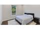 Cozy bedroom with a soft rug, a comfortable bed and view to the outside at 11280 Granite Ridge Dr # 1009, Las Vegas, NV 89135