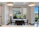 Modern dining area featuring large windows and stylish lighting at 11280 Granite Ridge Dr # 1009, Las Vegas, NV 89135