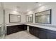 Spa-like bathroom featuring double sinks, quartz countertops and a glass shower at 11280 Granite Ridge Dr # 1009, Las Vegas, NV 89135