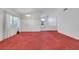 Spacious living room with neutral walls and carpet at 1230 Pagentry Dr, North Las Vegas, NV 89031