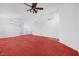 Spacious living room with carpet and chandelier at 1230 Pagentry Dr, North Las Vegas, NV 89031