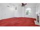 Bright living room with a fireplace and arched windows at 1230 Pagentry Dr, North Las Vegas, NV 89031