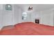 Open living room with fireplace and ample natural light at 1230 Pagentry Dr, North Las Vegas, NV 89031