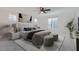 Serene primary bedroom with neutral tones, ample natural light, and stylish furnishings for a peaceful retreat at 1328 Graphite Ave, Henderson, NV 89002