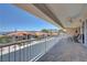 Spacious balcony with tile flooring and outdoor seating, offering panoramic views at 144 Desert Valley Dr, Boulder City, NV 89005