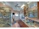 Bathroom features a modern shower, soaking tub, double vanity, and stylish finishes at 144 Desert Valley Dr, Boulder City, NV 89005
