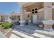 Inviting front entrance with stone steps and decorative potted plants, showcasing the home's curb appeal at 144 Desert Valley Dr, Boulder City, NV 89005