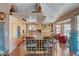 Well-equipped kitchen with stainless steel appliances, a kitchen island with seating, and hardwood floors at 144 Desert Valley Dr, Boulder City, NV 89005