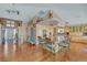 Spacious living area featuring hardwood floors, a kitchen island, and an open floor plan at 144 Desert Valley Dr, Boulder City, NV 89005