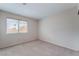 Empty bedroom with neutral carpet and natural light at 1587 Bermuda Dunes Dr, Boulder City, NV 89005