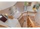 Aerial view of home's entryway and staircase showcasing tile flooring and natural light at 1587 Bermuda Dunes Dr, Boulder City, NV 89005