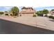 Charming two-story home with well-maintained desert landscaping and an attached two-car garage at 1587 Bermuda Dunes Dr, Boulder City, NV 89005