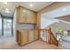 Hallway featuring built-in cabinets and storage, leading to the stairs and other rooms at 1587 Bermuda Dunes Dr, Boulder City, NV 89005