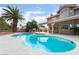 Gorgeous pool with spa and patio, ideal for relaxation, set in a beautifully landscaped backyard at 1587 Bermuda Dunes Dr, Boulder City, NV 89005