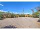 Spacious, gravel backyard offers ample space for landscaping and outdoor enjoyment at 1600 E Mcdonald Ave, North Las Vegas, NV 89030