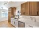 Stylish kitchen with stainless steel appliances, a large sink, and bright natural light at 1600 E Mcdonald Ave, North Las Vegas, NV 89030