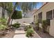 Backyard with desert landscaping, stone pathway, and jacuzzi at 175 Palta Ct, Henderson, NV 89074