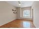 Inviting bedroom with hardwood floors, decorative shelving, a window seat, and ample natural light at 175 Palta Ct, Henderson, NV 89074