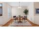 Cozy dining area with hardwood floors, plantation shutters, and ample natural light, perfect for intimate meals at 175 Palta Ct, Henderson, NV 89074