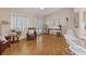 Bright living room with hardwood floors, plantation shutters, and comfortable seating, ideal for relaxing and entertaining at 175 Palta Ct, Henderson, NV 89074