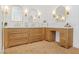 Elegant bathroom featuring double vanities, modern fixtures, and beautiful herringbone-patterned brick floors at 1990 Country Cove Ct, Las Vegas, NV 89135