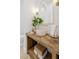 Chic powder room featuring a vessel sink, unique wood counter, and decorative mirror at 1990 Country Cove Ct, Las Vegas, NV 89135