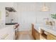 Bright kitchen with white cabinetry, a farmhouse sink, and stainless steel appliances at 1990 Country Cove Ct, Las Vegas, NV 89135