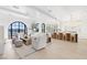 Open-concept living room flowing into the kitchen with high ceilings and hardwood floors at 1990 Country Cove Ct, Las Vegas, NV 89135