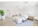 Serene main bedroom retreat with sitting area, tray ceiling, and modern decor at 1990 Country Cove Ct, Las Vegas, NV 89135