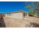 Low maintenance backyard with desert landscaping, house has sliding door and many windows at 2008 Royal Gardens Pl, North Las Vegas, NV 89084