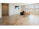 Open floorplan featuring tile flooring, living, and dining spaces at 2008 Royal Gardens Pl, North Las Vegas, NV 89084