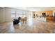 Open-concept living room with a dining area and kitchen at 2008 Royal Gardens Pl, North Las Vegas, NV 89084