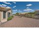 Backyard featuring desert landscaping, mature trees, and ample space at 2401 Ocean Edge Ct, Las Vegas, NV 89134