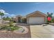 Well-maintained one-story home with desert landscaping and a two-car garage at 2401 Ocean Edge Ct, Las Vegas, NV 89134
