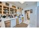 Light and airy kitchen with wooden cabinets, and modern appliances at 2401 Ocean Edge Ct, Las Vegas, NV 89134